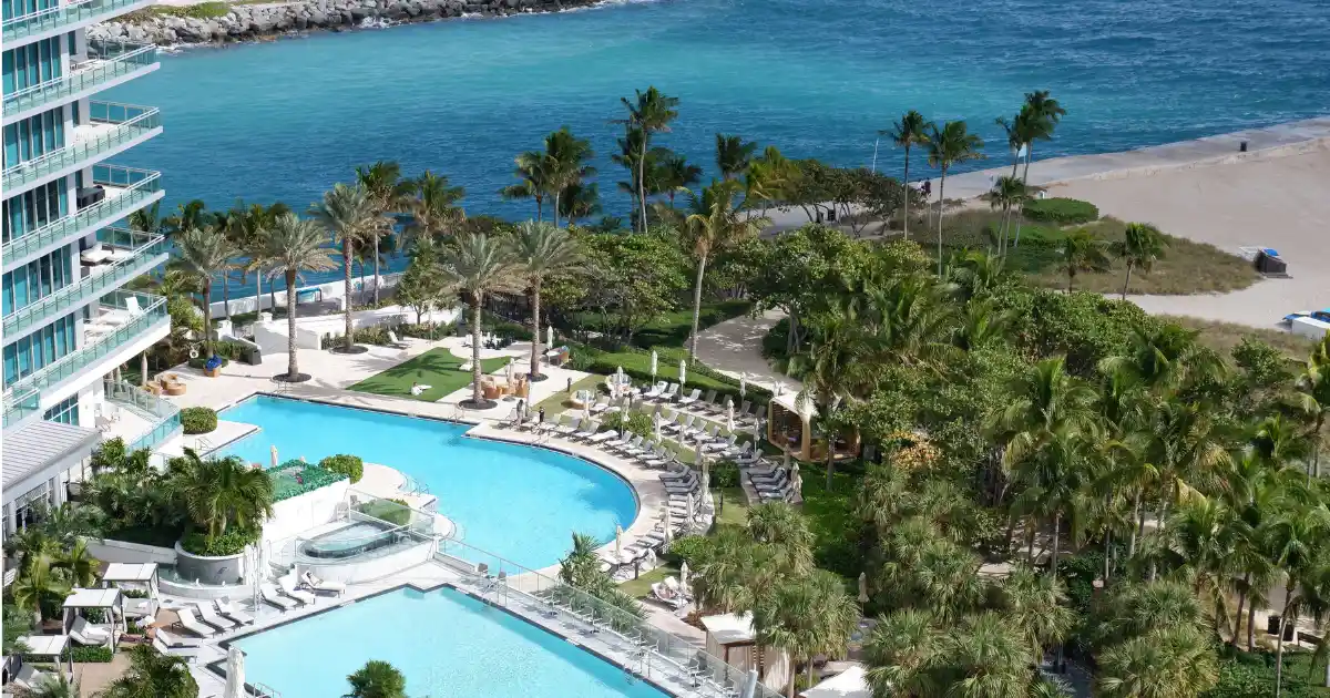 Aerial view of Miami resort pools beside the ocean — illustrative image for all inclusive family resorts east coast