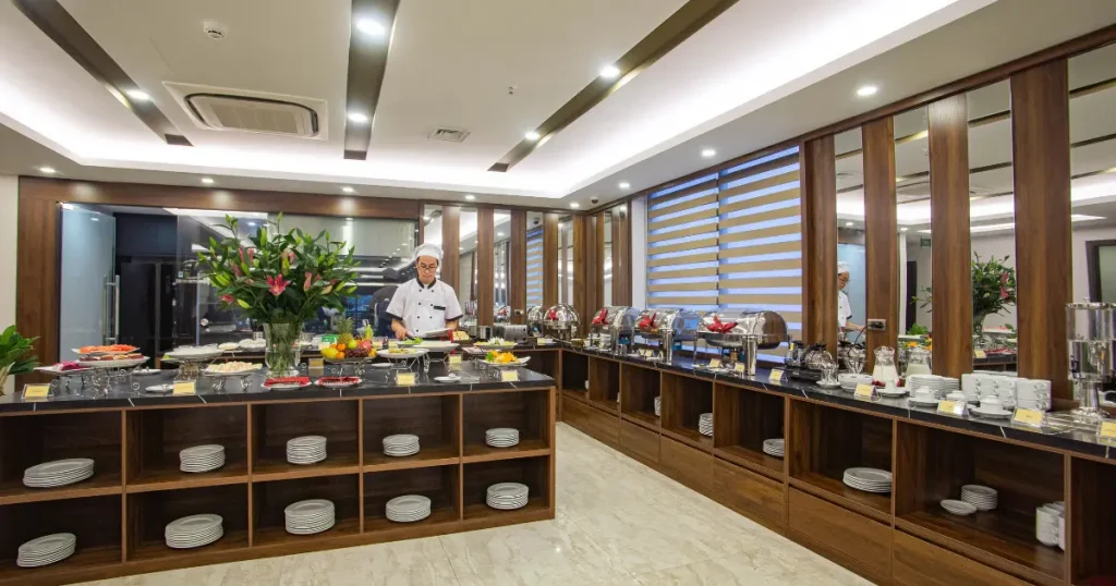 Hotel buffet with a selection of dishes and serving stations