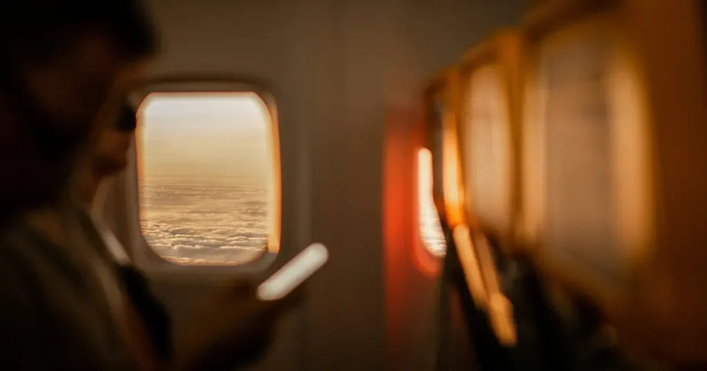 Flight essentials for entertainment with a smartphone during an airplane journey